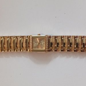 Omax gold watch